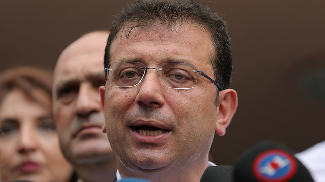 Ekrem Imamoglu, mayoral candidate of the main opposition Republican People's Party (CHP), speaks as he arrives to cast his ballot at a polling station in Istanbul, Turkey, June 23, 2019. REUTERS/Huseyin Aldemir

