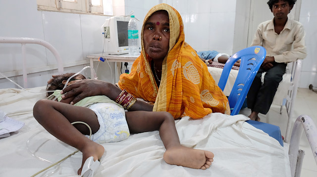 Relatives visit child patients who suffer from acute encephalitis syndrome at a hospital in Muzaffarpur, in the eastern state of Bihar, India, June 20, 2019. Picture taken on June 20, 2019.
