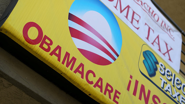 A sign on an insurance store advertises Obamacare in San Ysidro, San Diego, California, US.
