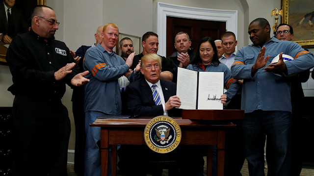 US President Donald Trump is after signing a proclamation to establish tariffs on imports of steel and aluminum at the White House in Washington, U.S., March 8, 2018.