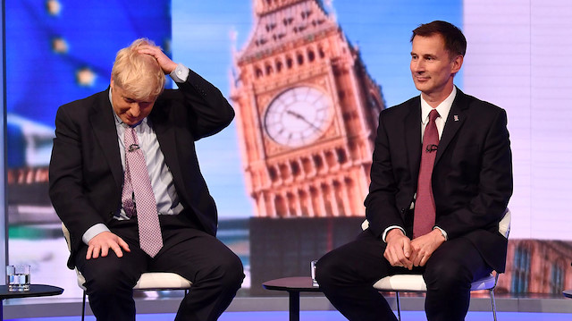 Boris Johnson and Jeremy Hunt appear on BBC TV's debate with candidates vying to replace British PM Theresa May, in London, Britain June 18, 2019.
