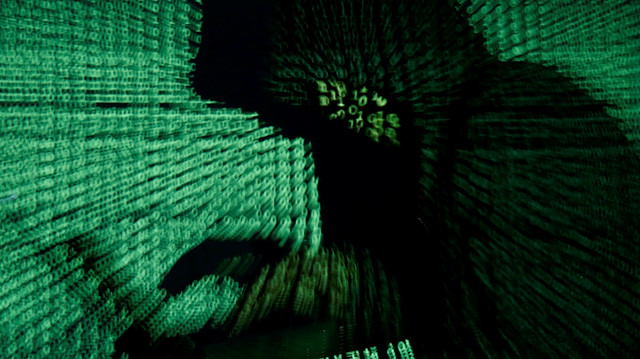 FILE PHOTO: A man holds a laptop computer as cyber code is projected on him in this illustration picture taken on May 13, 2017. Capitalizing on spying tools believed to have been developed by the U.S. National Security Agency, hackers staged a cyber assault with a self-spreading malware that has infected tens of thousands of computers in nearly 100 countries. REUTERS/Kacper Pempel/Illustration/File Photo

