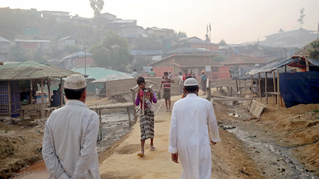 File photo: Rohingya refugees walk on a road at the Balukhali camp in Cox's Bazar, Bangladesh