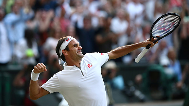 Switzerland's Roger Federer celebrates after winning his semi-final match against Spain's Rafael Nadal 
