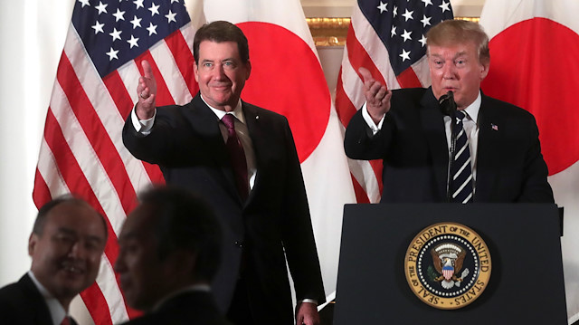 U.S. Ambassador to Japan Bill Hagerty, left, and President Donald Trump at an event with business leaders in Tokyo on May 25