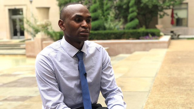 Paul Njoroge, who lost his wife, three children and his mother-in-law in the crash of Ethiopian Airlines flight 302, sits in the courtyard of Rayburn House Office Building during an interview in Washington, U.S.