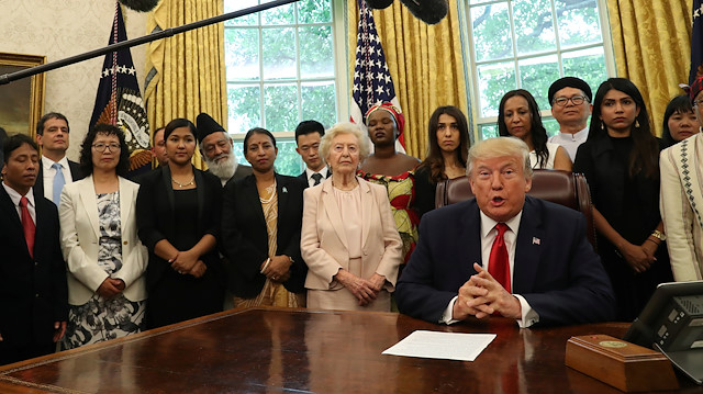 U.S. President Donald Trump speaks to reporters while hosting a group of victims of religious persecution in the Oval Office of the White House in Washington, U.S., July 17, 2019. REUTERS/Leah Millis  

