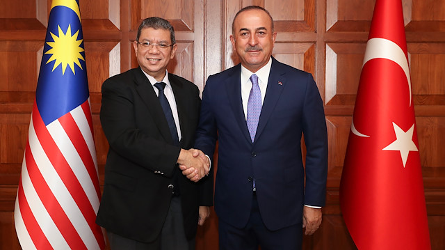 Turkey’s Foreign Minister Mevlüt Çavuşoğlu & his Malaysian counterpart Saifuddin Abdullah