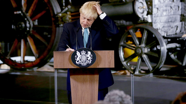 Britain's Prime Minister Boris Johnson touches his hair during a speech on domestic priorities at the Science and Industry Museum in Manchester, Britain July 27, 2019. Lorne Campbell/Pool via REUTERS

