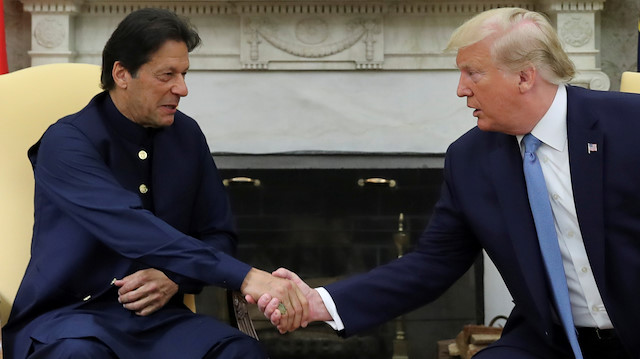 FILE PHOTO: U.S. President Donald Trump greets Pakistan's Prime Minister Imran Khan in the Oval Office at the White House in Washington, U.S., July 22, 2019. REUTERS/Jonathan Ernst/File Photo

