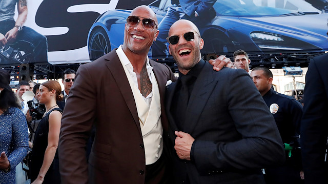 FILE PHOTO: Cast members Dwayne Johnson and Jason Statham arrive at the premiere for "Fast & Furious Presents: Hobbs & Shaw" in Los Angeles, California, U.S., July 13, 2019. REUTERS/Mario Anzuoni/File Photo  