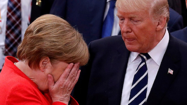 File photo: Donald Trump and Angela Merkel