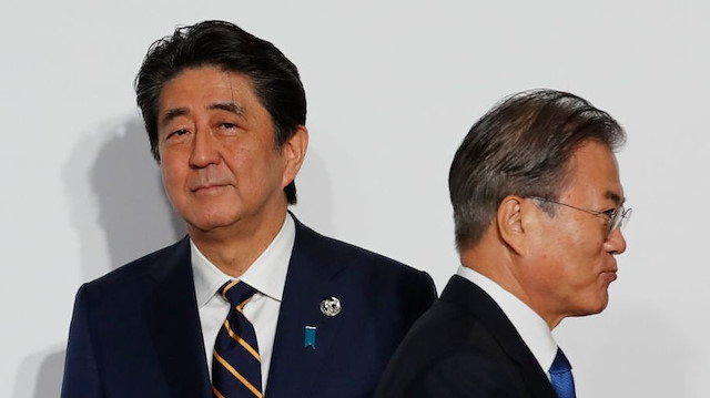 Japonya Başbakanı Şinzo Abe ve Güney Kore Başkanı Moon Jae-in.