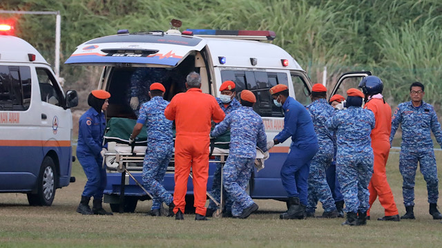 A body believed to be 15-year-old Irish girl Nora Anne Quoirin who went missing is brought into a ambulance in Seremban, Malaysia, August 13, 2019. REUTERS/Lim Huey Teng

