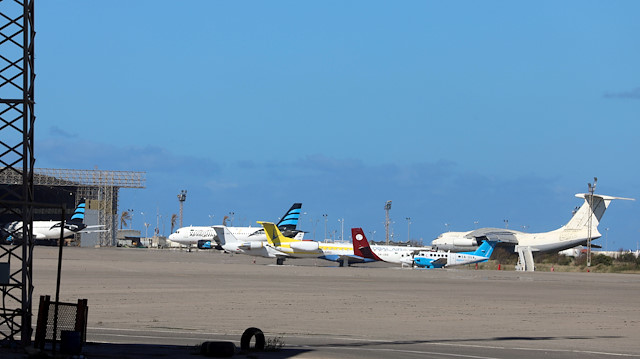 Airplanes are seen at Mitiga airport, after an air strike in Tripoli, Libya