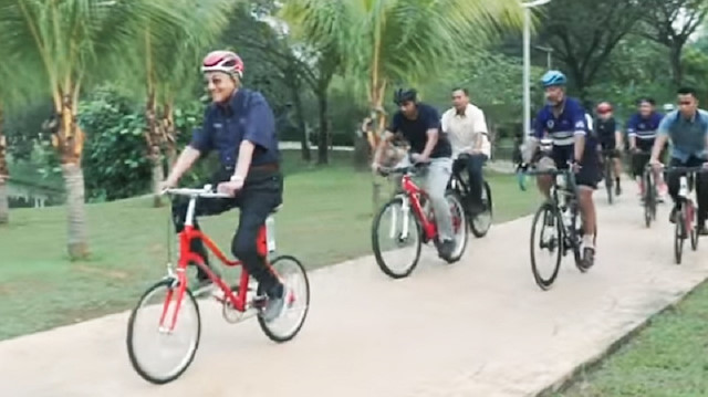 Prime Minister of Malaysia Mahathir Mohamad rides bike in Kuala Lumpur.