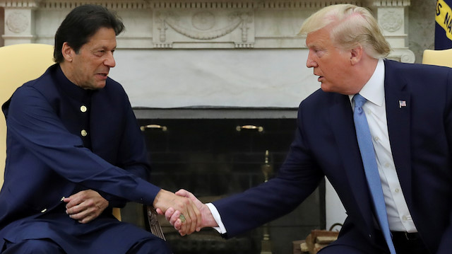 FILE PHOTO: U.S. President Donald Trump greets Pakistan's Prime Minister Imran Khan in the Oval Office at the White House in Washington, U.S., July 22, 2019. REUTERS/Jonathan Ernst/File Photo

