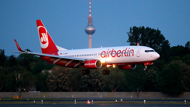 An aircraft operated by German carrier Air Berlin lands in Berlin's Tegel airport. 