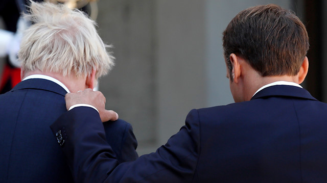 Macron, Elysee Sarayı'nda İngiltere Başbakanı Boris Johnson ile ortak basın toplantısı düzenledi.

