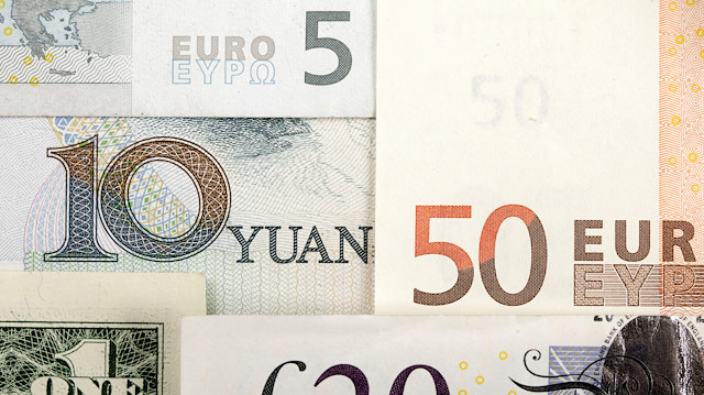 FILE PHOTO: Arrangement of various world currencies including Chinese Yuan, US Dollar, Euro, British Pound, shot January 25, 2011. REUTERS/Kacper Pempel/Illustration/File Photo/File Photo


