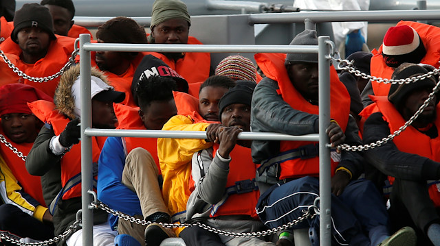 Migrants who were stranded on the German NGO Sea-Eye migrant rescue ship 