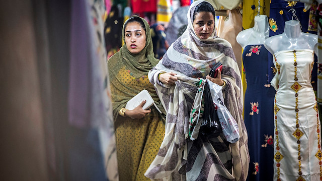 Iranian women walk in a local bazaar at Bandar Abbas, Iran August 22, 2019. Picture taken August 22, 2019. Nazanin Tabatabaee/