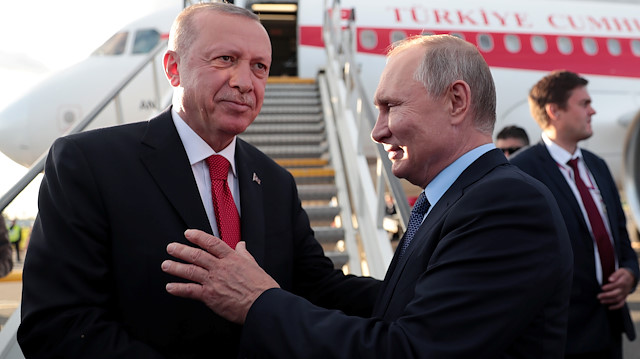 Turkish President Tayyip Erdogan chats with his Russian counterpart Vladimir Putin before his departure at Zhukovsky Airport near Moscow, Russia, August 27, 2019. Murat Cetinmuhurdar/Presidential Press Office/Handout 