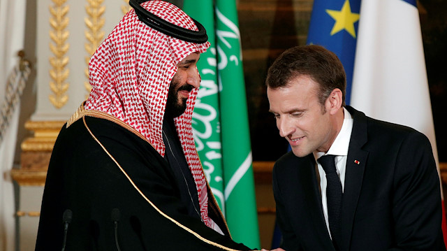 FILE PHOTO: French President Emmanuel Macron and Saudi Arabia's Crown Prince Mohammed bin Salman attend a press conference at the Elysee Palace in Paris, France, April 10, 2018. Yoan Valat/Pool via Reuters/File Photo  