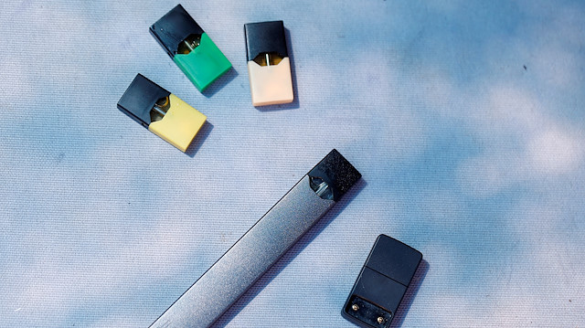 File photo:  A Juul e-cigarette and pods are seen in this picture illustration 
