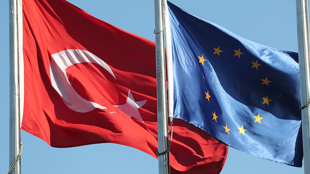 European Union (R) and Turkish flags