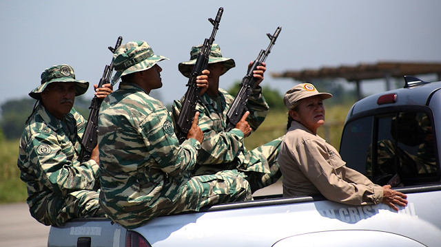 Members of the National Guard and Bolivarian militia take part in a military exercise in Garcia Hevia airport in La Fria, Venezuela September 10, 2019. REUTERS/Carlos Eduardo Ramirez

