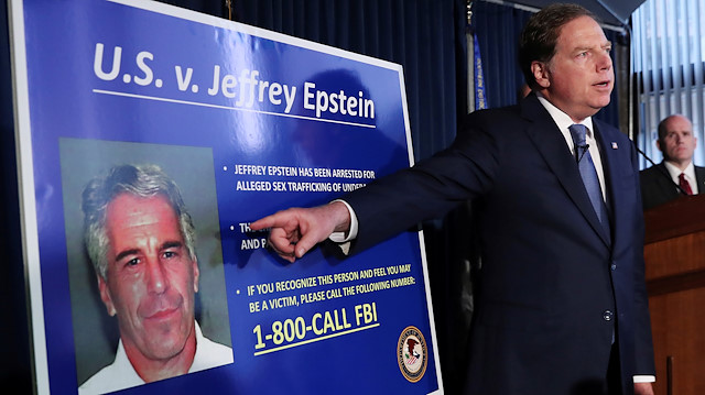 Geoffrey Berman, United States Attorney for the Southern District of New York, points to a photograph of Jeffrey Epstein as he announces the financier's charges of sex trafficking of minors and conspiracy to commit sex trafficking of minors, in New York, US.