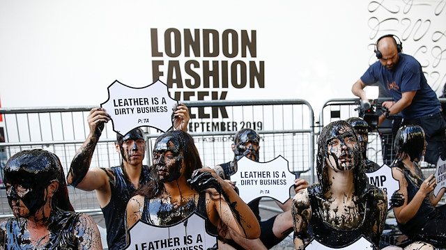 Activists from PETA stage a demonstration outside a venue during London Fashion Week in London, Britain, September 13, 2019.