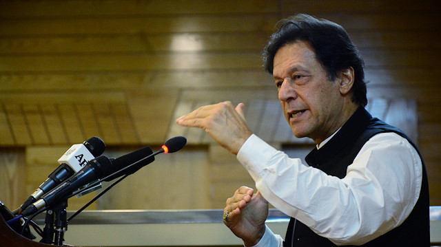 File photo: Pakistani Prime Minister Imran Khan gestures as he addresses the Azad Kashmir parliament 