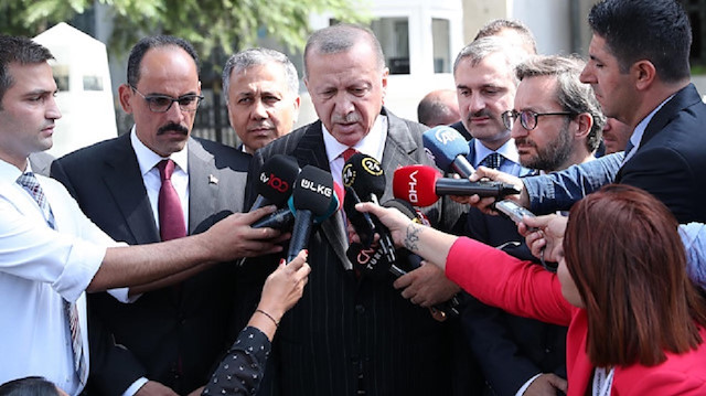 Recep Tayyip Erdoğan speaks to media