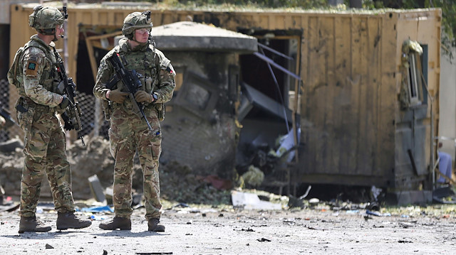 Foreign troops with NATO-led Resolute Support Mission investigate at the site of a suicide attack in Kabul, Afghanistan September 5, 2019. REUTERS/Omar Sobhani  