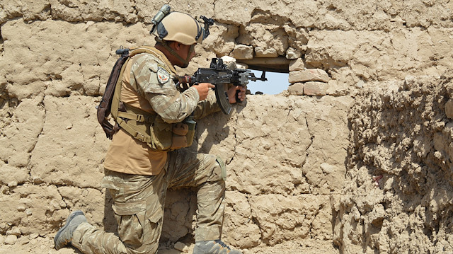 A member of Afghan security force takes position during a battle with the Taliban in Kunduz province, Afghanistan September 1, 2019. 
