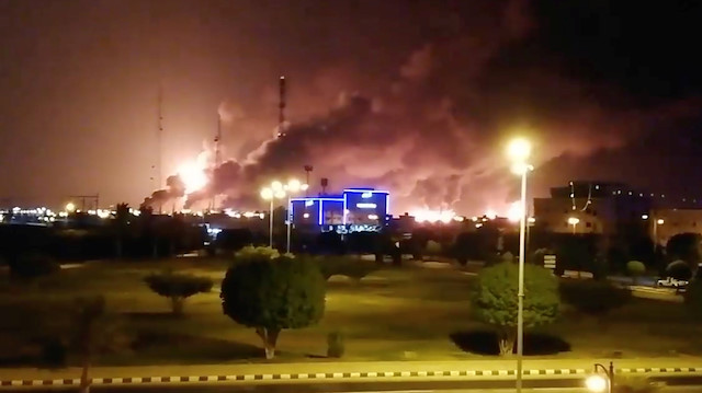 Smoke is seen following a fire at an Aramco factory in Abqaiq, Saudi Arabia