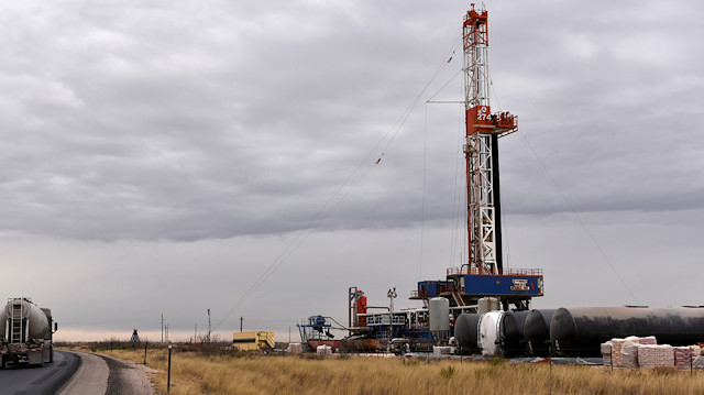 A drilling rig operates in the Permian Basin oil and natural gas production area 