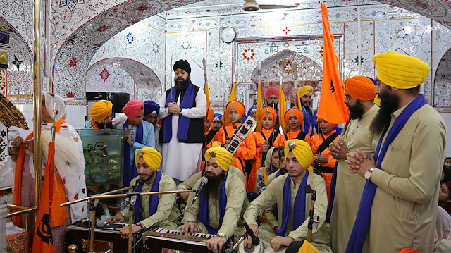 Sikh devotees gather as they perform religious songs during the Baisakhi festival at Panja Sahib shrine in Hasanabdal, Pakistan April 14, 2019. Picture taken April 14, 2019. REUTERS/Saiyna Bashir

