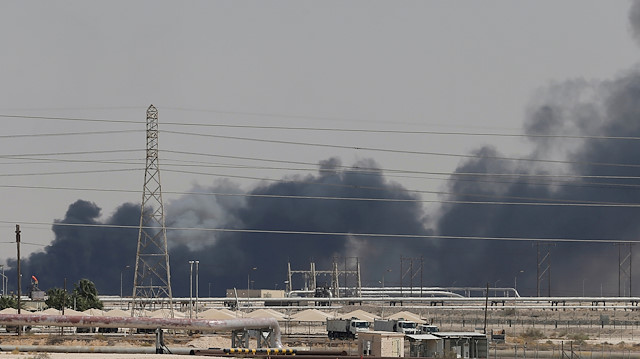 Smoke is seen following a fire at Aramco facility in the eastern city of Abqaiq