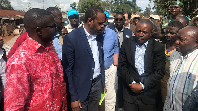 Democratic Republic of the Congo's Health Minister Oly Ilunga and his delegation are seen during a visit, near Mangina, North Kivu, Democratic Republic of the Congo.