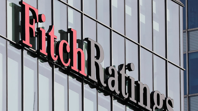 The Fitch Ratings logo is seen at their offices at Canary Wharf financial district