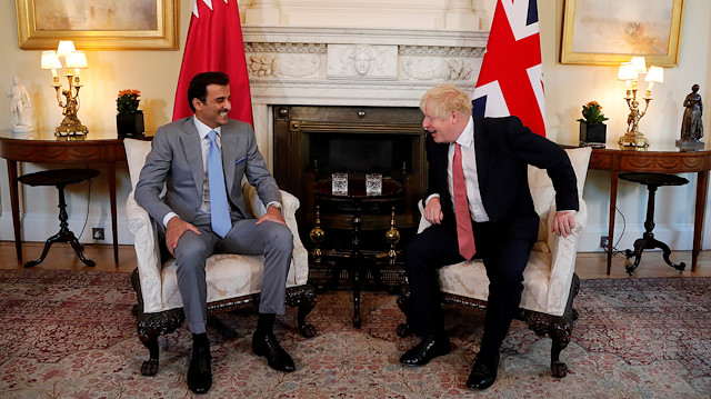 Britain's Prime Minister Boris Johnson meets with Qatar's Emir Sheikh Tamim bin Hamad Al Thani at Downing Street in London, Britain September 20