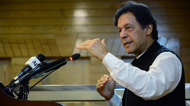 Pakistani Prime Minister Imran Khan gestures as he addresses the Azad Kashmir parliament on Pakistan's 72nd Independence Day in Muzaffarabad, Pakistan-administered Kashmir, August 14, 2019. REUTERS/Stringer

