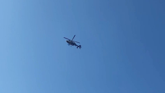Hasar incelemesi yapan polis helikopteri. 