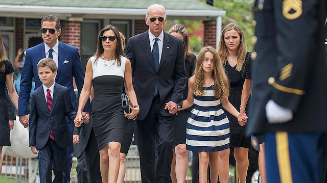 (L-R) Beau Biden's brother Hunter (top L), son Hunter (bottom L), widow Hallie, Vice President Joe Biden and daughter Natalie.