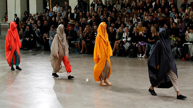 Models present creations by designer Satoshi Kondo as part of his Spring/Summer 2020 women's ready-to-wear collection show for fashion house Issey Miyake during Paris Fashion Week in Paris, France, September 27, 2019. REUTERS/Gonzalo Fuentes

