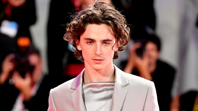 FILE PHOTO: The 76th Venice Film Festival - Screening of the film "The King" out of competition - Red Carpet Arrivals - Venice, Italy September 2, 2019 - Actor Timothee Chalamet poses. REUTERS/Piroschka van de Wouw/File Photo

