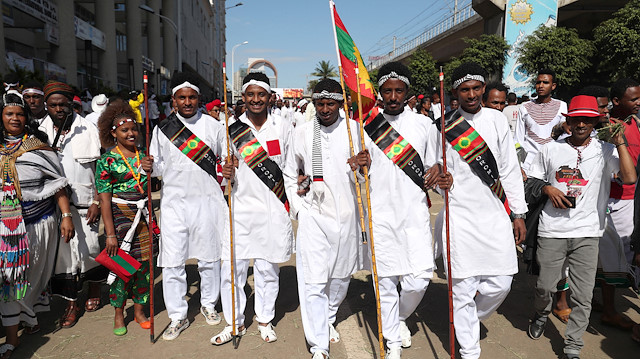 Ethiopian men dressed in traditional costumes take part in the Irreecha celebration, the Oromo People thanksgiving ceremony in Addis Ababa, Ethiopia. October 5